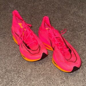 NWOT Nike Women's Pink and Yellow Athletic Shoes